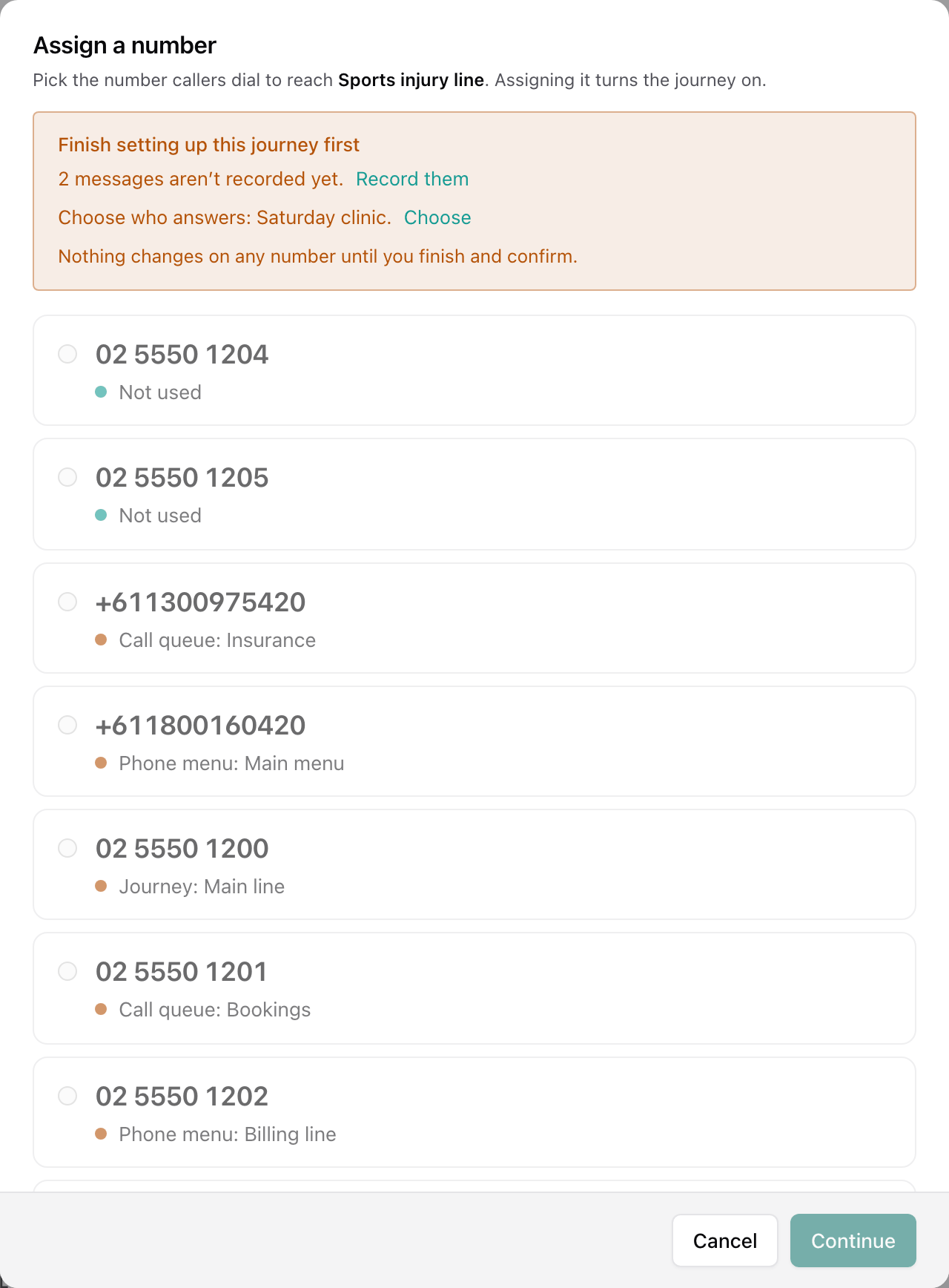 The Assign a number dialog listing the account's numbers and what uses each one